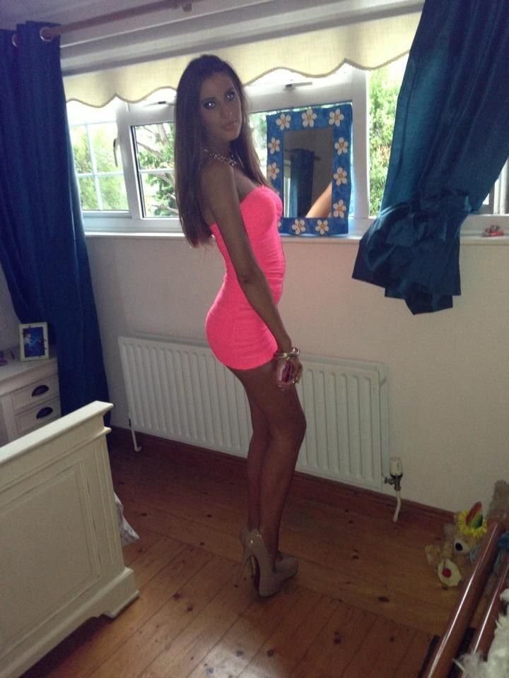 2016 Clubbing Outfits: 14 Ideas from Corsets to Boots 4 Woman in a pink strapless minidress with beige platform heels and a clutch bag.