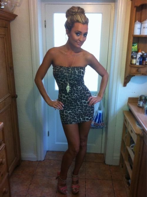 2016 Clubbing Outfits: 14 Ideas from Corsets to Boots 6 Woman in animal print strapless mini dress and red platform sandals posing indoors.