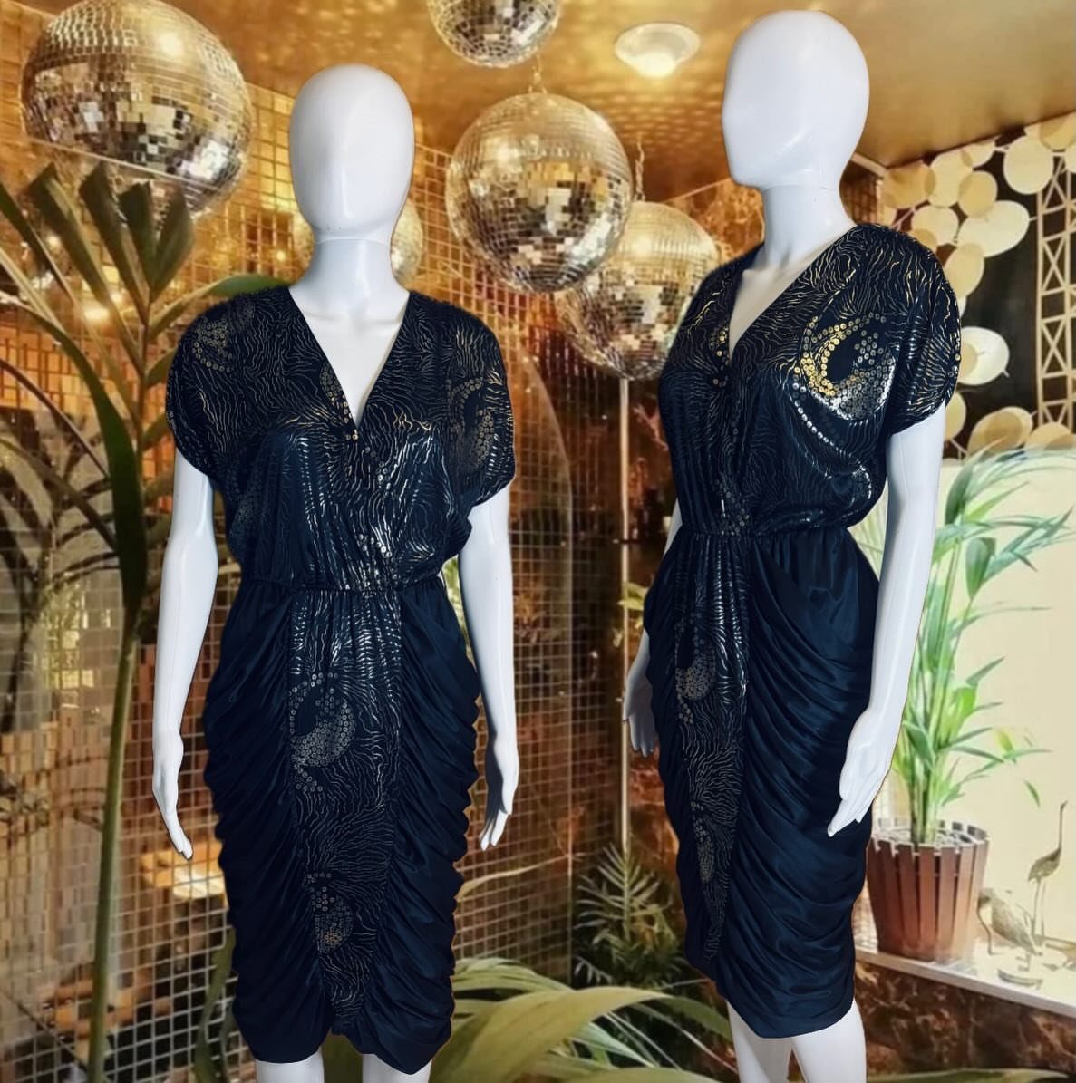 Navy blue metallic ruched dresses on white mannequins with disco balls in background
