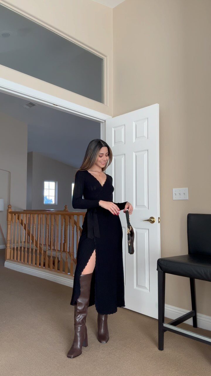 Black or Brown Boots for Every Outfit: 8 Ideas to Wear 4 Woman in a long black dress wearing tall brown leather boots indoors.