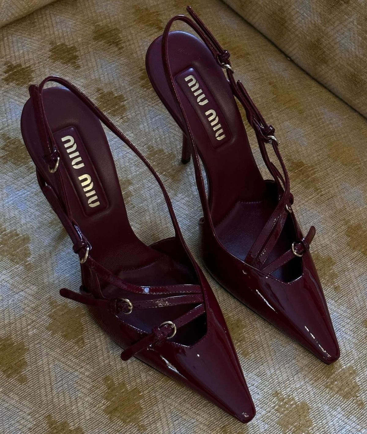 Miu Miu Kitten Heels: 7 Ideas for Every Outfit 2 Burgundy patent leather Miu Miu kitten heels with straps on patterned fabric