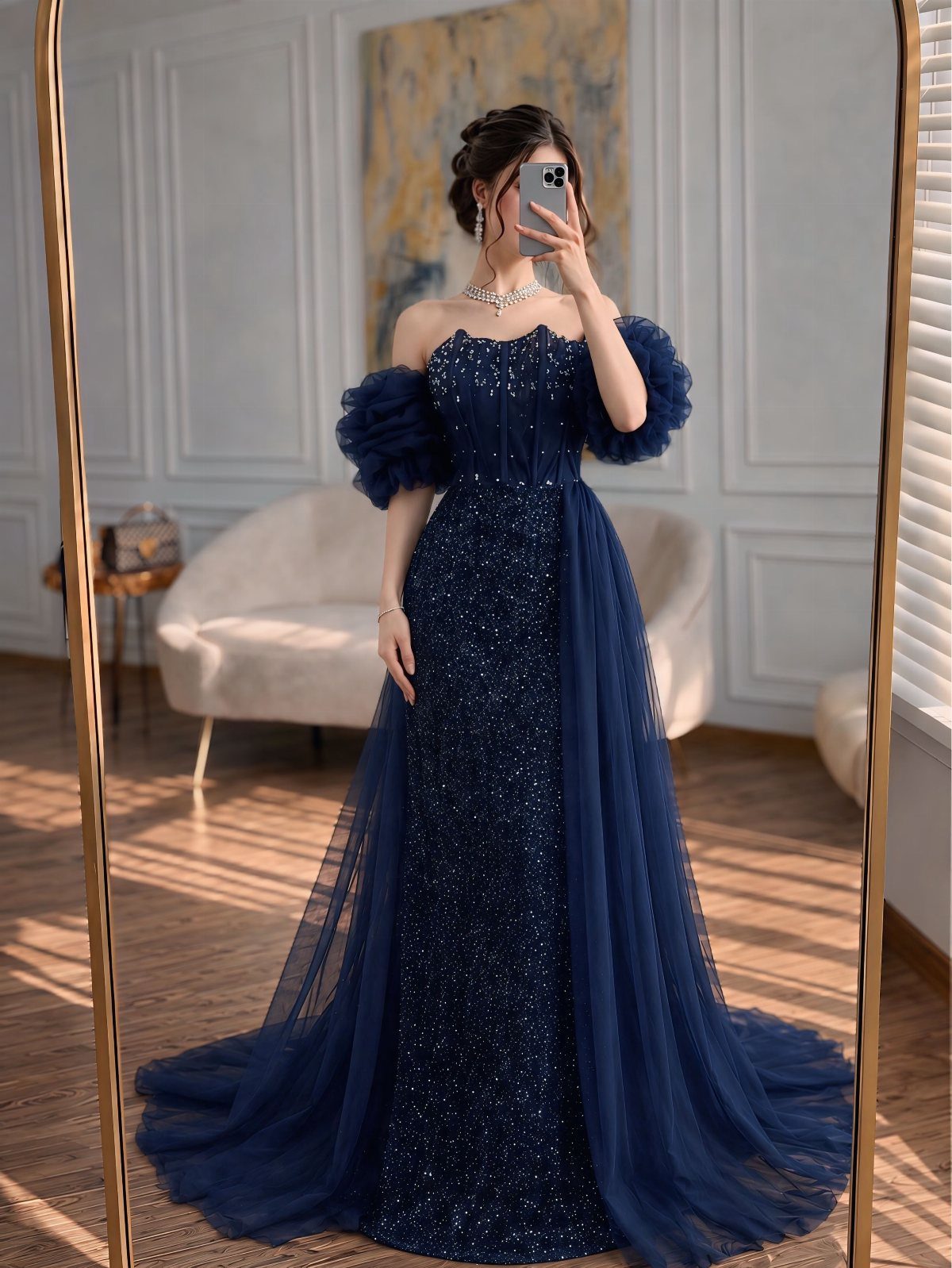 Navy Blue Ball Gown Ideas: 9 Styles From Tulle to Corset 3 Woman wearing a navy blue sequined gown with a voluminous tulle overskirt