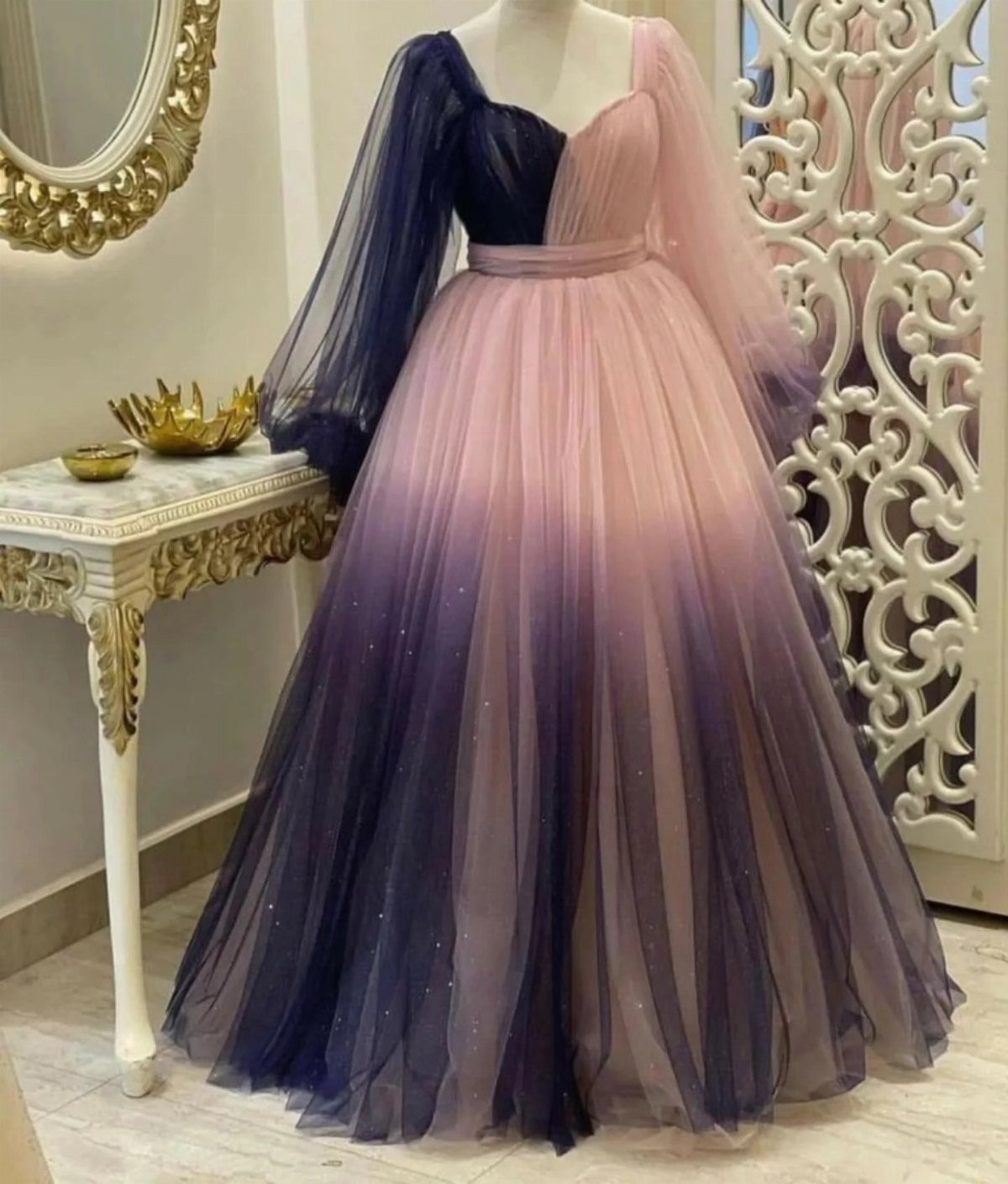 Pink and Blue Dresses: 7 Ideas for Every Style 7 Ombre tulle gown transitioning from light pink to navy blue on a mannequin