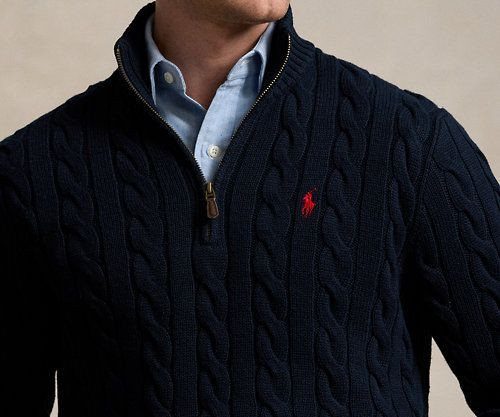Ralph Lauren Polo Fits for Every Day: 10 Outfit Ideas 9 Navy cable-knit quarter-zip sweater layered over a light blue button-down shirt.