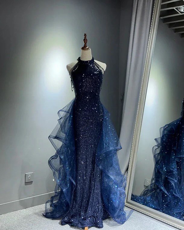 Star Wars Prom Dress Ideas: 3 Gowns From Vader to Padme 3 Navy blue sparkling gown with ruffled tulle overskirt displayed on a mannequin