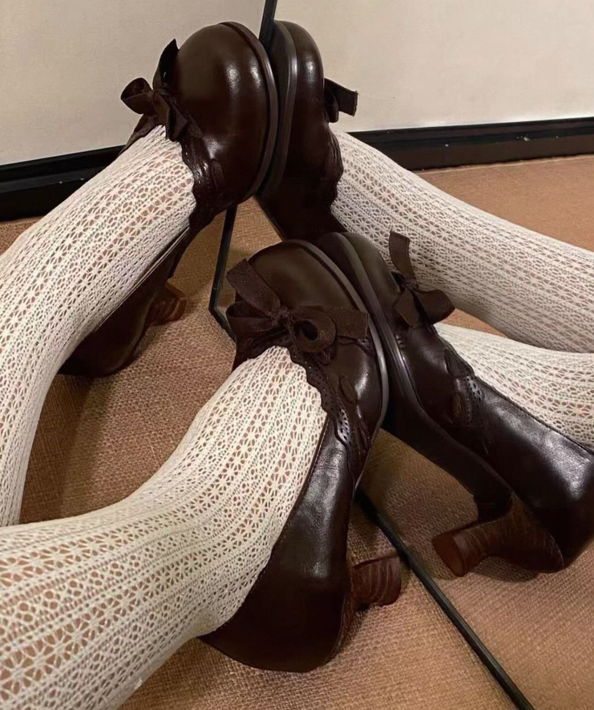 Vintage Shoes and Heels: 8 Styles From Mary Janes to Boots 8 Dark brown leather block heel pumps with bows worn with white lace tights.