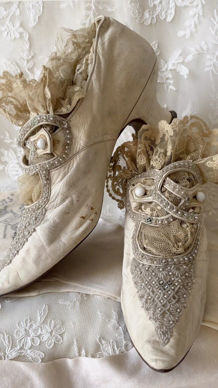 Vintage Shoes and Heels: 8 Styles From Mary Janes to Boots 4 Cream vintage wedding shoes with silver beadwork, pearls, and lace ruffles.